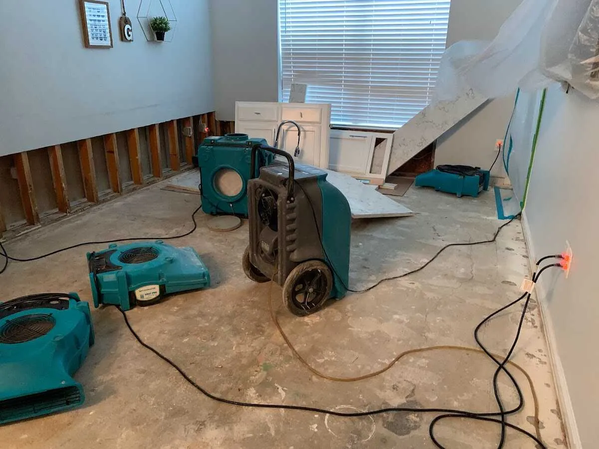 Dehumidifier in flood-cut room for Water Damage Restoration in Celina